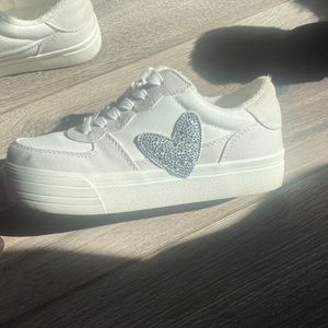 Girls GB girls tennis shoe with sparkly heart detail. Very gently used like new!